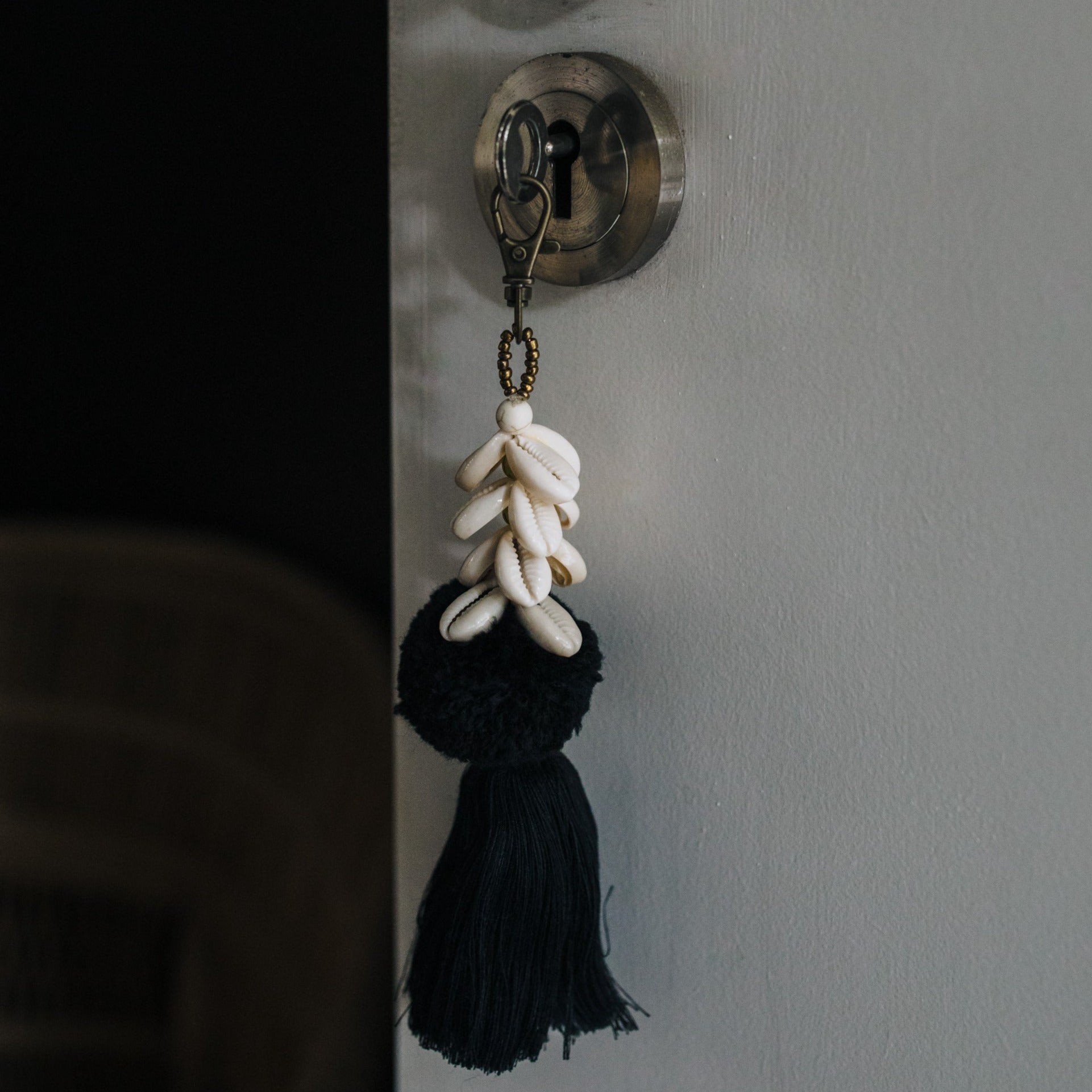 Black Pom Pom with Cowrie Shell Keychain